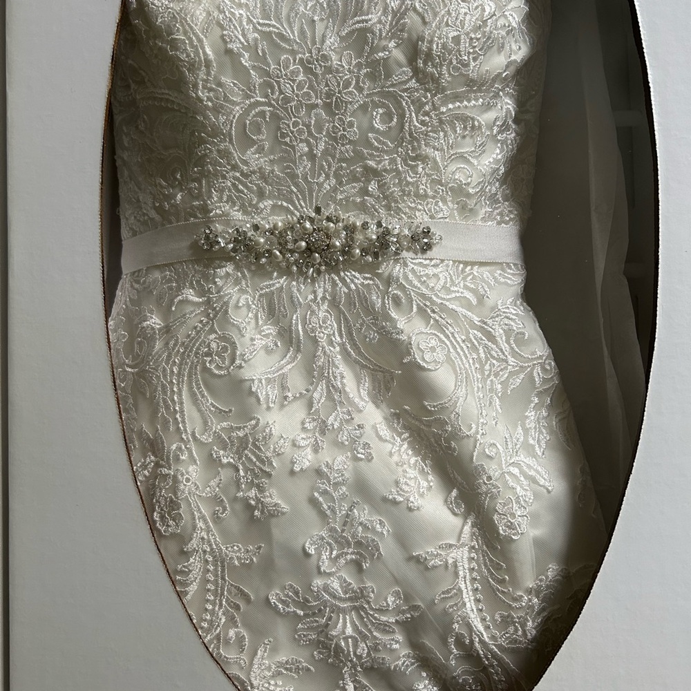 Beautiful lacy sweetheart neck wedding dress